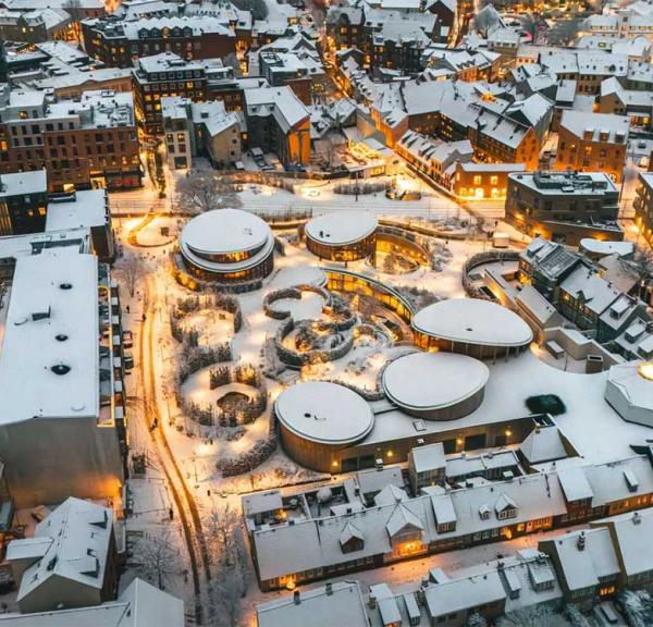 The old quarter with lights and snow